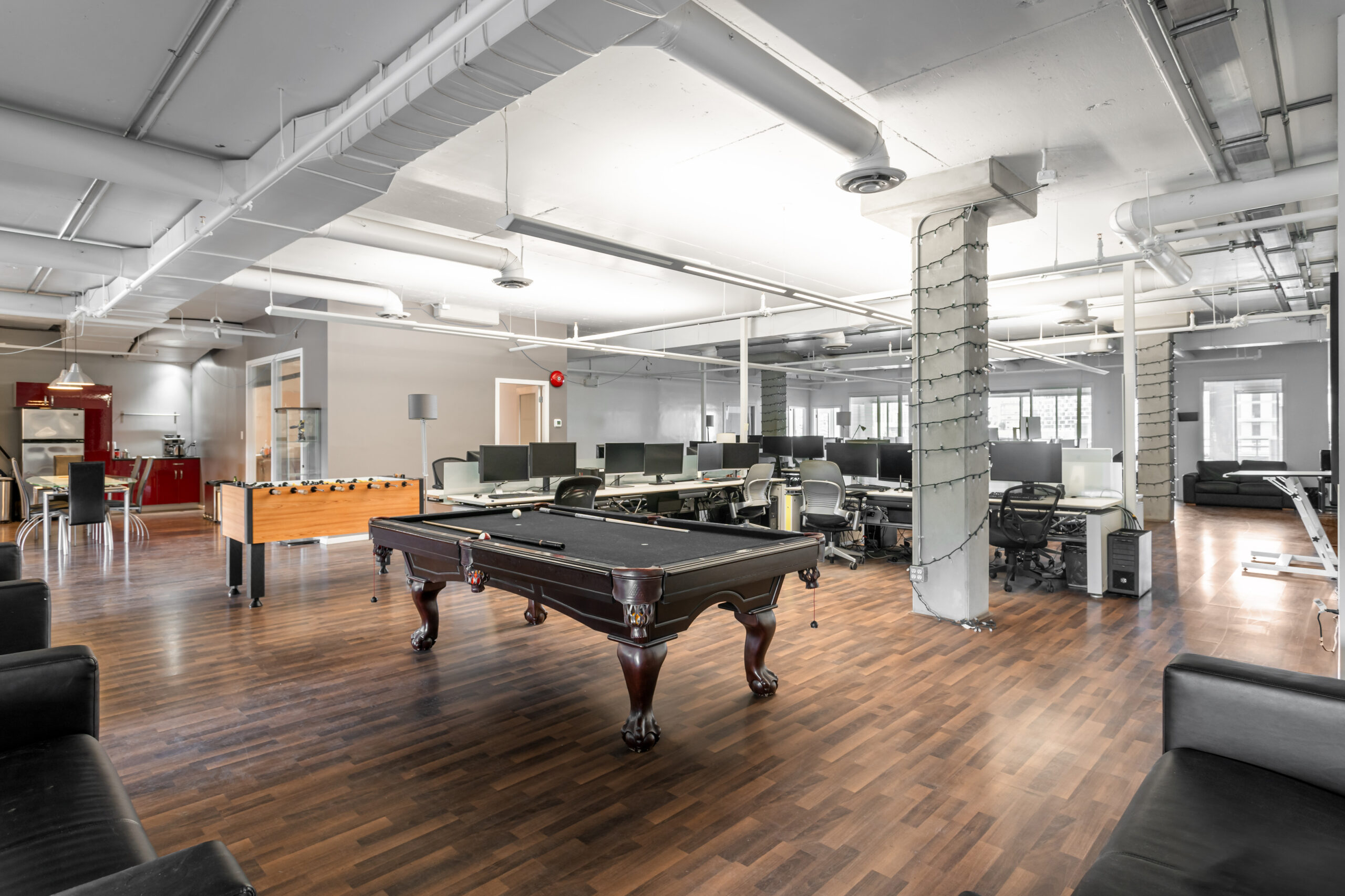 Interior of Mount Pleasant Office Space in Vancouver with a pool table.